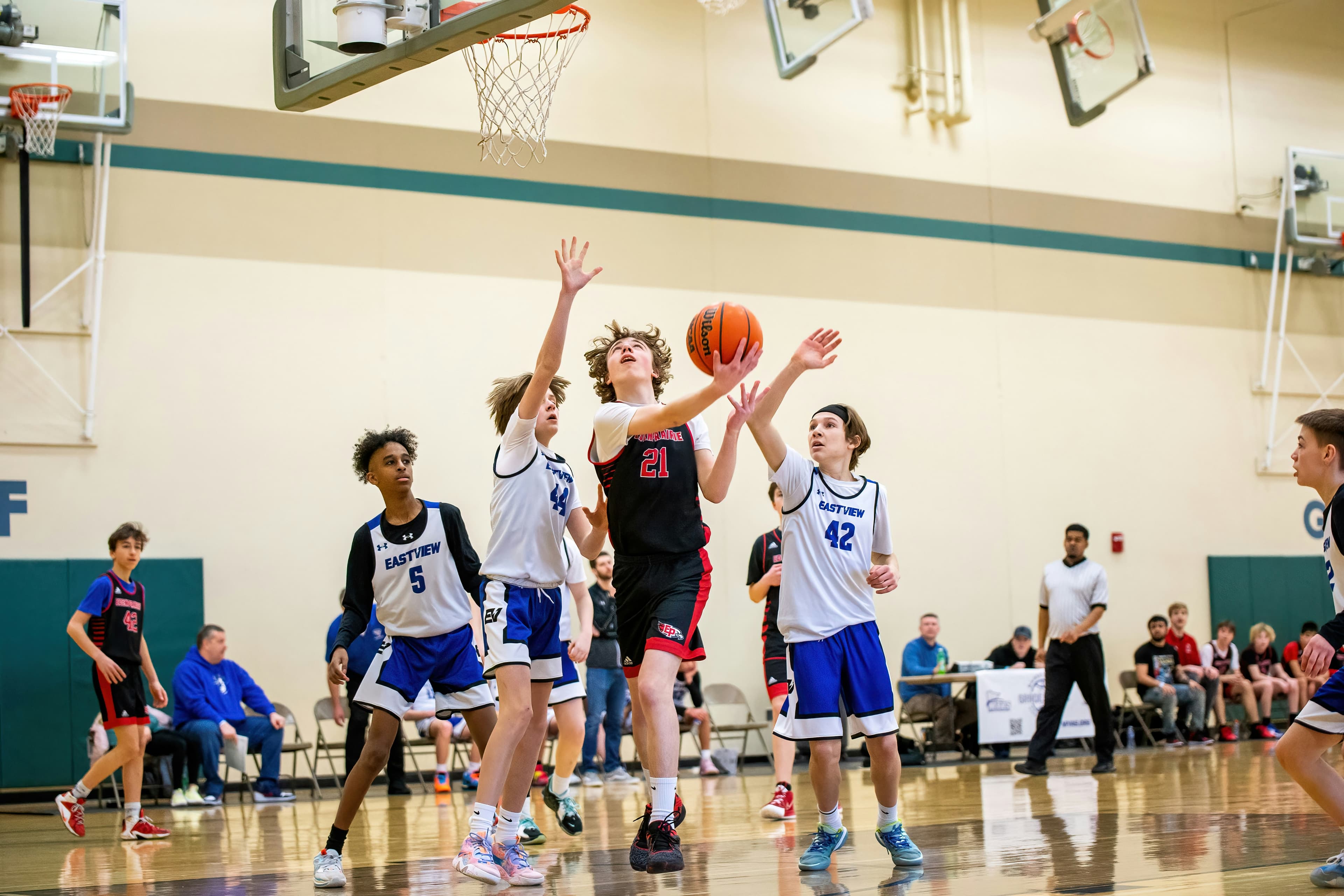 Kids enjoying a youth basketball camp in Edmonton run by Vision Elite Academy