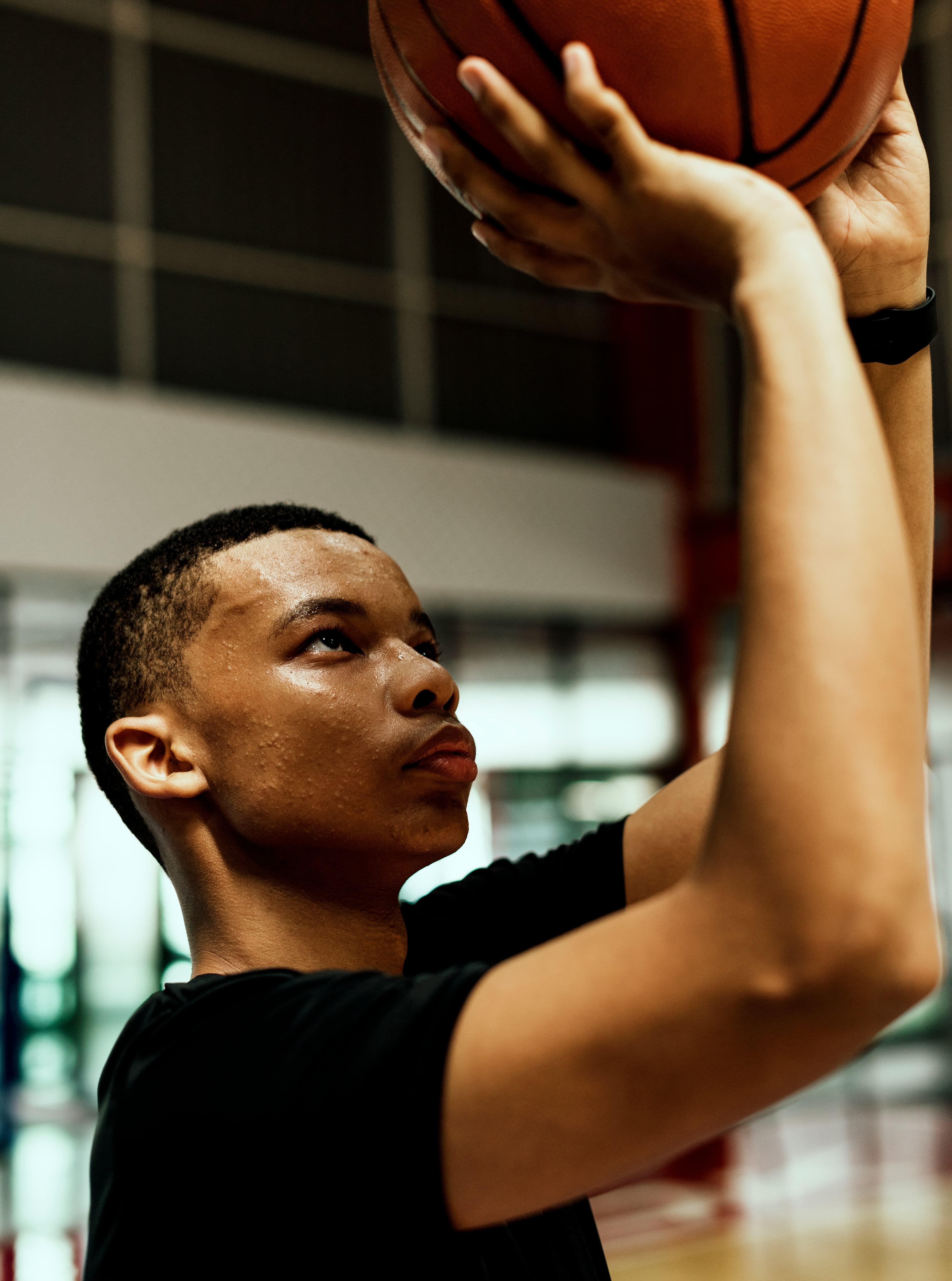 Athlete elevating for a layup during Edmonton basketball training