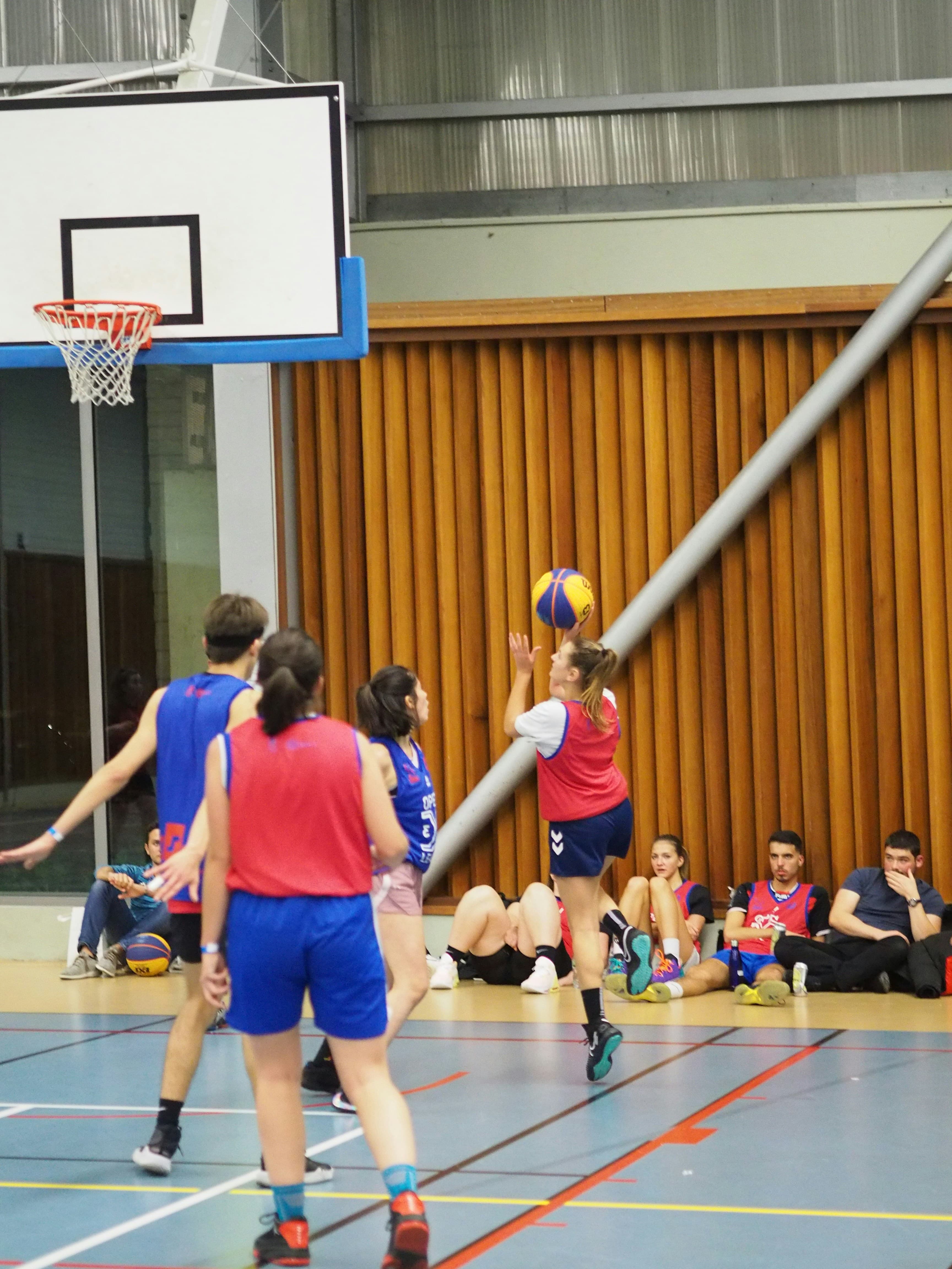 Beginner athletes learning basketball skills in Edmonton